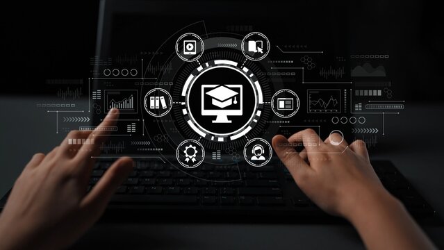 Hands Interacting with Digital Learning Interface on Laptop Screen Featuring Icons for Education and Technology. Entropy.