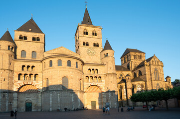 Fototapeta premium High Cathedral of Saint Peter in Trier, Moselle Valley Germany, roman catholic dom, brickwork tower facade 