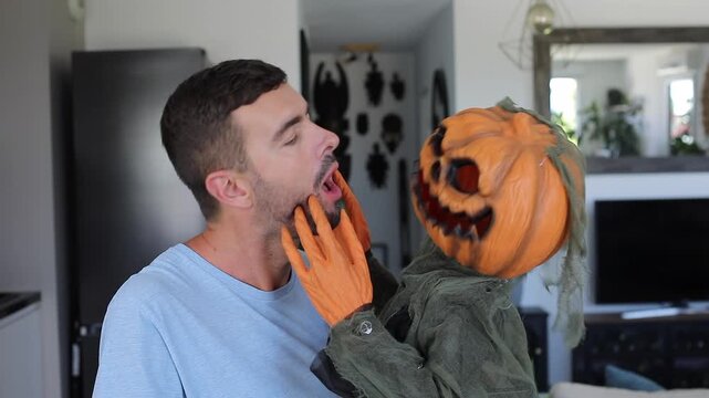Man Kissing Creepy Halloween Pumpkin Creature