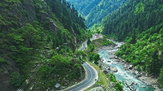 Aerial Drone View of Winding Mountain Road Along Kunhar River, Naran Kaghan Pakistan