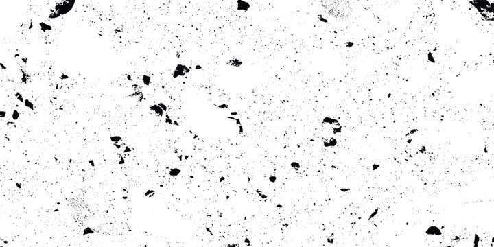Black grunge texture on white background with scattered debris and smudges for creative design projects and artistic overlays
