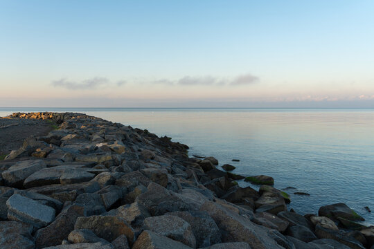 Beautiful Black Sea landscape, Poti city coast. Large stones on the shore. Morning