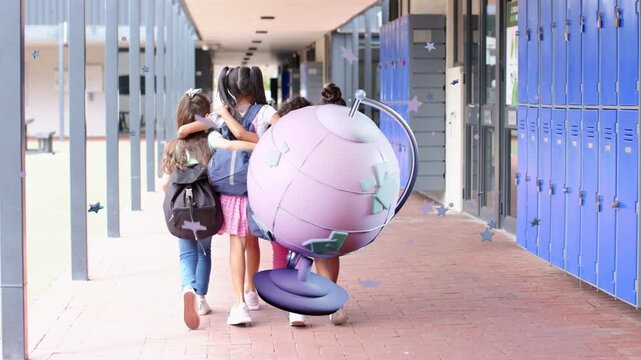 Four students walking school hall stepping making 3D globe emerging rotating covering bags to class