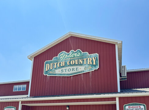 Low angle view of Yoder's Dutch Country Store against blue sky. Shipshewana, IN USA - July 8, 2026