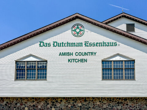 Exterior of the Das Dutchman Essenhaus Amish Country Kitchen Restaurant against blue sky.
Middlebury, IN USA - July 8, 2026
