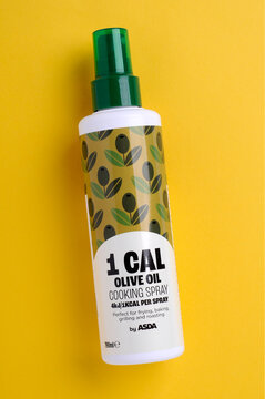 Asda Olive Oil Cooking Spray Bottle Flat lay on yellow background