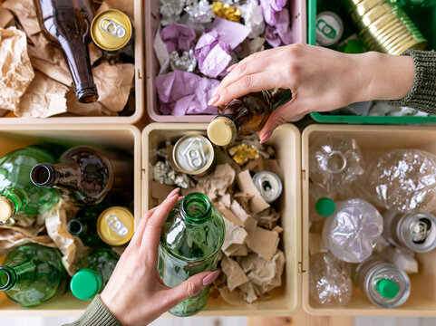 Sorting recyclable materials in bins for sustainable waste management