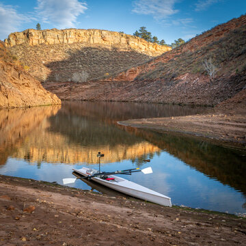 coastal sculling shell in sandstone canyon of Horsetooth Reservoir in Colorado in fall scenery