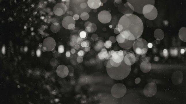 Abstract night city lights bokeh background, blurred street illumination, vintage film grain and dust texture