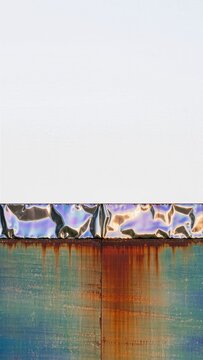 Abstract rusty metal and iridescent foil background mockup vertical