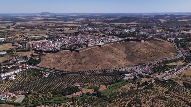 Elvas fortress surrounded by whitewashed buildings reflecting centuries of Portuguese heritage in Alentejo landscape