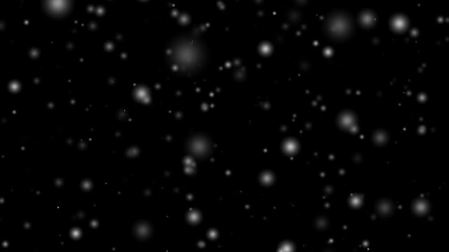 Floating white glowing particles on a black background, ethereal minimalist motion Video