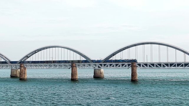 An Indian Railways train crossing the Godavari arch bridge in Rajahmundry, India in June 2026