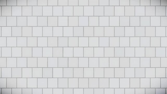 Abstract pattern background featuring clean, light grey rectangular tiles with subtle texture and dark grout lines, a seamless loop motion graphics video background.