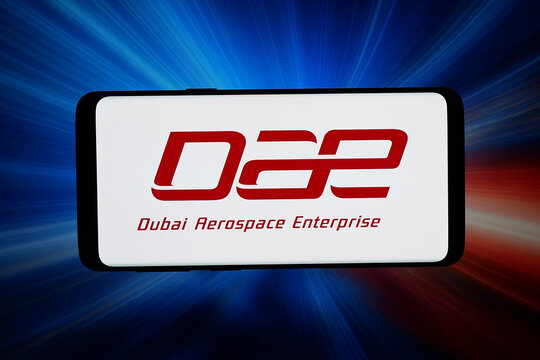 Stuttgart, Germany - 07-10-2026: In this photo illustration, the logo of company Dubai Aerospace Enterprise Ltd. (DAE) is displayed on a smartphone in front of abstract background on computer screen.