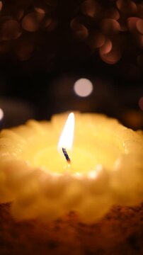 All Hallows' Day. Solemnity of All Saints. All Saints' Day greeting banner with bokeh effect. Candles with fire on shiny background