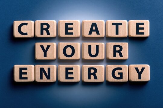 Create your energy phrase made of wooden letter tiles on blue background