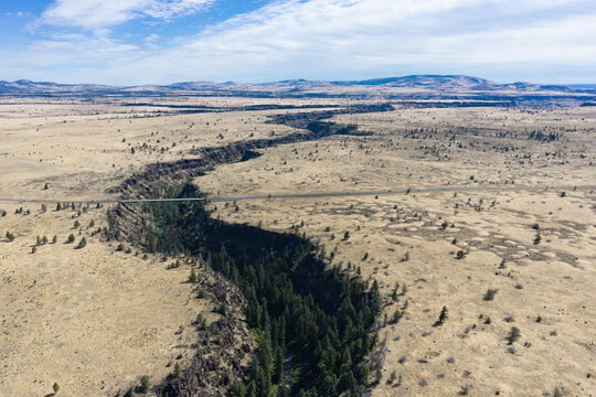 The Mill Creek bridge crosses a 230 foot deep canyon on the Central Oregon plateau between Bend and Portland. This beautiful area of high desert is part of the Warm Springs reservation.