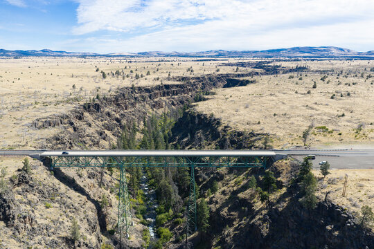 The Mill Creek bridge crosses a 230 foot deep canyon on the Central Oregon plateau between Bend and Portland. This beautiful area of high desert is part of the Warm Springs reservation.