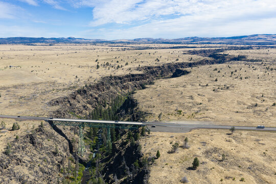 The Mill Creek bridge crosses a 230 foot deep canyon on the Central Oregon plateau between Bend and Portland. This beautiful area of high desert is part of the Warm Springs reservation.