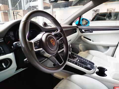 Moscow, Russia - July 11, 2026: The interior of the luxurious Porsche Macan car, which is currently on display at the car dealership.