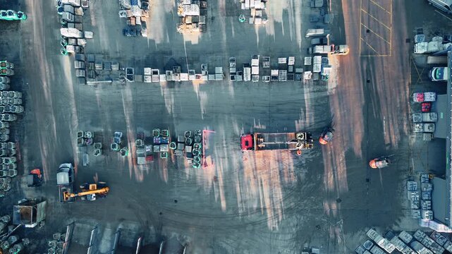 Aerial view of a large auto lot at dusk. Industrial chemical plant