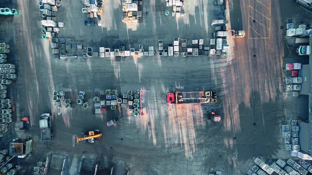 Aerial view of a large vehicle storage yard. Industrial chemical plant