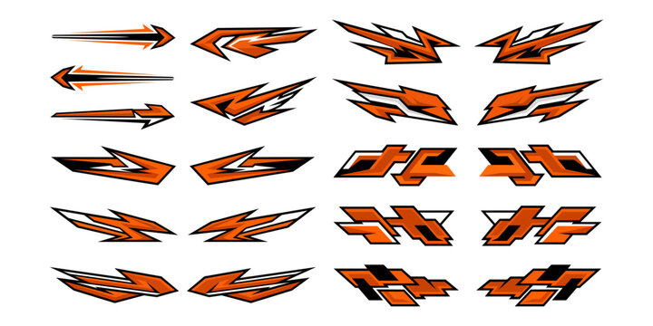 Collection of orange and black racing decals, sharp abstract speed shapes, and vehicle body wrap design elements