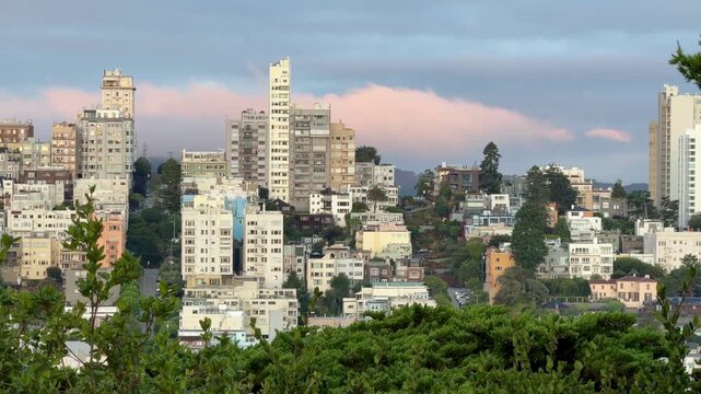 San Francisco, USA - September 10, 2025: Early morning view from Telegraph Hill overlooking Russian Hill and downtown San Francisco. Soft morning light highlights the city's iconic urban skyline.