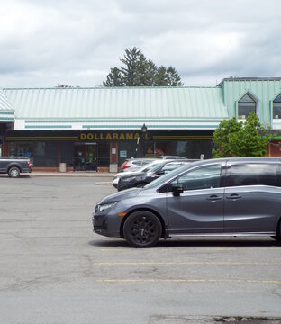 Aylmer,Quebec, Canada &ndash; May 24, 2026: The "Dollarama" store sits in a parking lot, offering items to shoppers looking for bon magasinage in this Canadian town at 375 Chem. d'Aylmer.