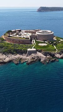 Vertical Drone Shot of Mamula Island, Montenegro, Former Medieval Fortress in Adriatic Sea