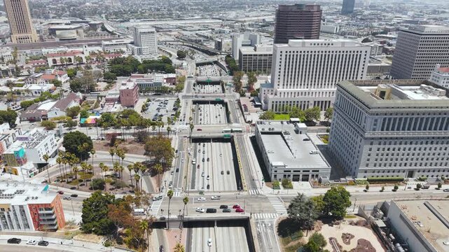 Los Angeles California USA, Drone Shot of Santa Ana Freeway US-101 Highway Traffic by Downtown Buildings