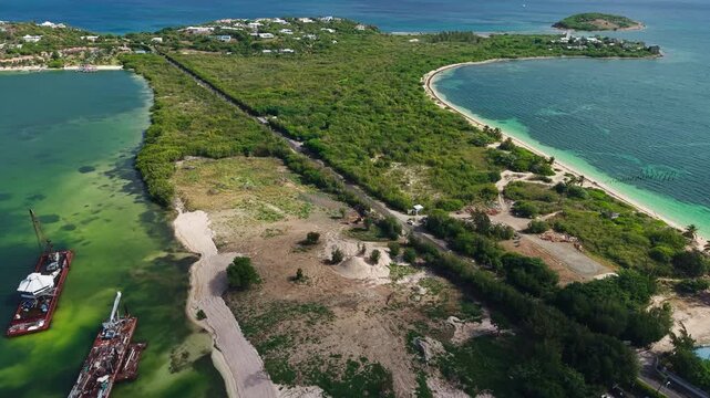 Drone Shot of Sandy Ground Area of St. Martin Island, Road and Buildings Between Caribbean Sea and Simpson Bay Lagoon