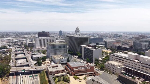Drone Shot of Los Angeles City Hall, Courthouse and Federal Buildings, Santa Ana Freeway Traffic, California USA