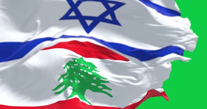 Flags of Israel and Lebanon waving isolated on green background