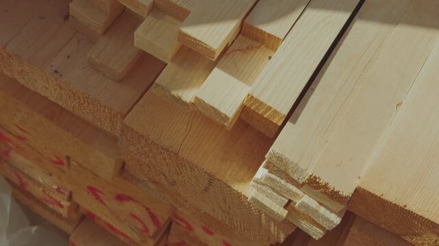 Close-up of sawn planks, a stack of wood, stacked planks