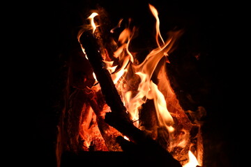 Fototapeta premium fire flames with sparks on a black background, close-up
