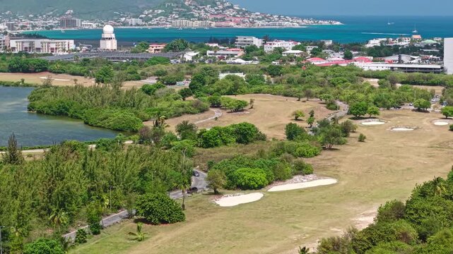 Drone Shot of Simpson Bay on St. Maarten Island, Airport by Caribbean Sea, Buildings and Landscape