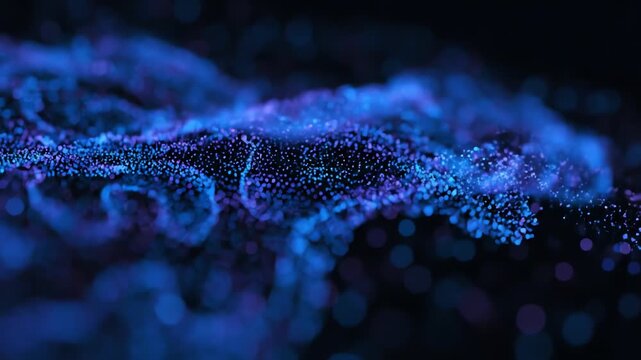 Abstract blue and purple bokeh particles form a flowing, nebulous shape