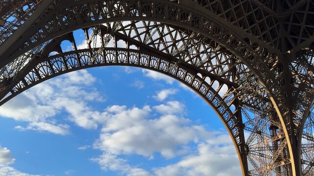 Eiffel Tower metal steel structure view from under tourist attraction in Paris France