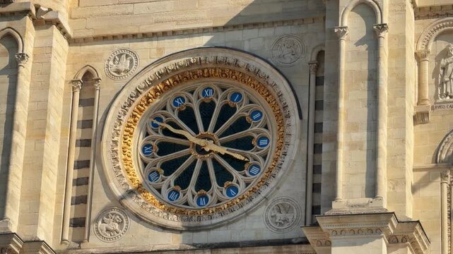19th-century clock on the west facade of the Basilica of Saint-Denis in Paris, France