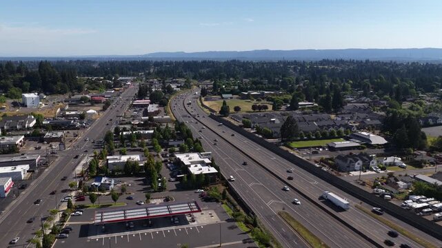 Aerial of Interstate 5 highway and commercial development in Clark County Washington with multilane highways and strip malls