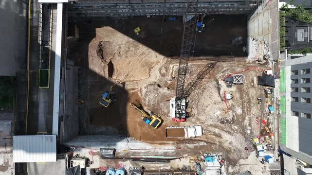 Aerial Top-Down View of an excavation site as Drone Hovers Overhead