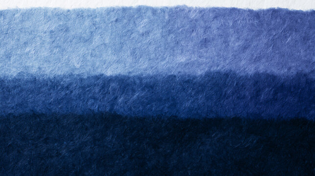 Abstract blue Japanese washi paper texture background with layered shades