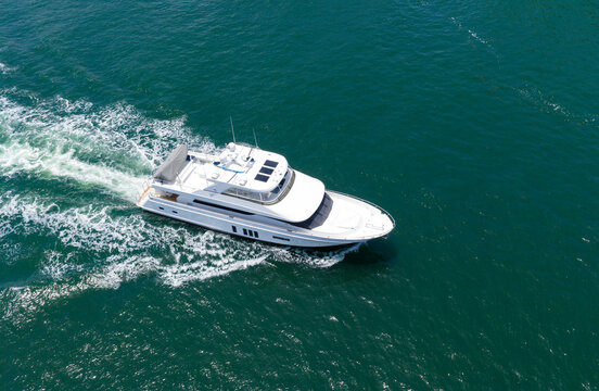 Sea motor boat. Sea summer vacation. Aerial motorboat. Yacht boat tour. Luxury boat yachting. Motorboat sailing at sea. Luxury charter yacht in sea. Motor yacht luxury vessel. Ocean adventure