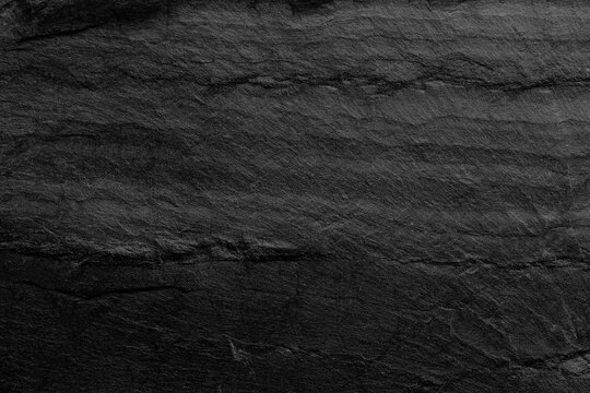 Dark grey black slate background or texture.