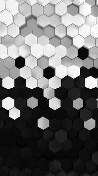 Black and white background of patterned hexagons. Smooth moving 3d rendered hex shapes creating a visual of sleek elegant motion for futuristic scientific or technical backgrounds. 3d render loop.