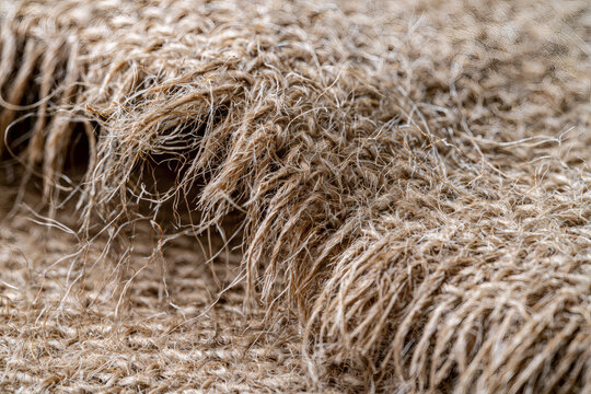 Brown hessian sackcloth burlap fabric close-up texture