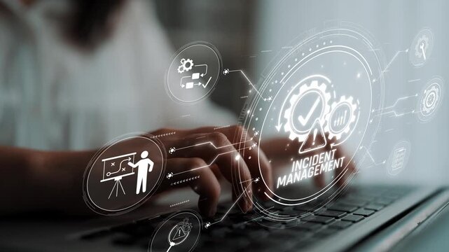 Hands on Keyboard Illustrating Incident Management with Digital Graphics and Icons in a Modern Office Setting Sigmoid