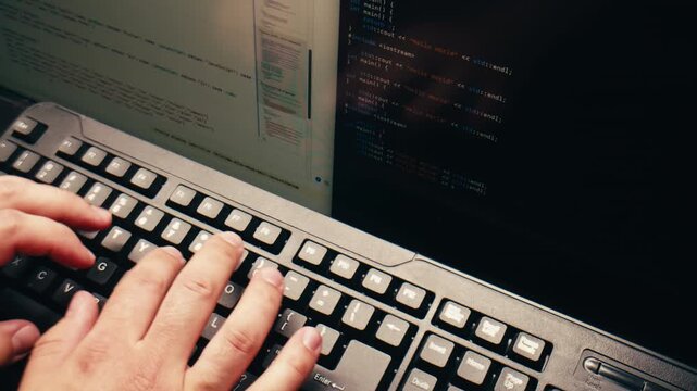 Man work with chatbot AI online, connecting with AI and using a chat bot. IT engineer software developer programmer interact with chat bot, making writing code. Typing on laptop keyboard